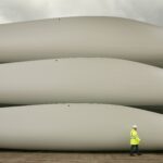 ROUGHLY 8,000 wind turbine blades in the U.S. will be removed in each of the next four years. Blades are typically taken to landfills. / BLOOMBERG NEWS FILE PHOTO/PETER MACDIARMID