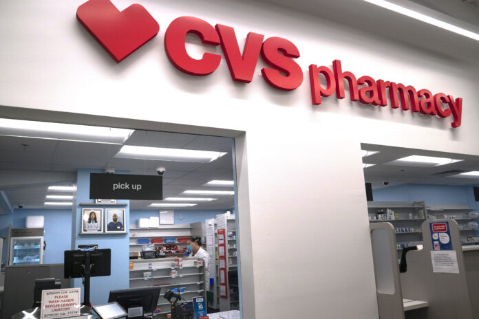 CVS HEALTH announced plans to fill 50,000 full-time, part-time and temporary roles amid the COVID-19 pandemic. / AP FILE PHOTO/CAROLYN KASTER