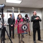 GOV. GINA M. RAIMONDO gives an update on the spread of the coronavirus in Rhode Island at a recent news conference. / PBN FILE PHOTO/ELIZABETH GRAHAM