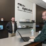 DEVIN FERBERG (left) and Jason Rider (right) are computer store technicians at The Right Click, an IT service company now offering pay-what-you-can services to clients. / COURTESY THE RIGHT CLICK