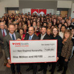 THE CVS HEALTH Charity Classic has been postponed due to COVID-19 concerns. The event raised $1 million dollar for 86 nonprofits in 2019. In the foreground, from the left, event co-host Brad Faxon, CVS Health President and CEO Larry Merlo, event co-host Billy Andrade, Eileen Howard Boone, CVS Health's senior vice president of corporate social responsibility and Faith Weiner, senior director of community relations at CVS Health, are joined by dozens of charitable partners whose organizations are the recipients of a $1 million dollar donation generated by the annual golf event. / COURTESY CVS HEALTH