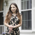 STILL WAITING: Musician Sasha McVeigh poses at her home in Springfield, Tenn. McVeigh had been working steadily in Nashville until the city shut down music clubs in mid-March because of the new coronavirus pandemic. Since then, she’s applied for unemployment benefits but so far has not received anything. / AP FILE PHOTO/MARK HUMPHREY