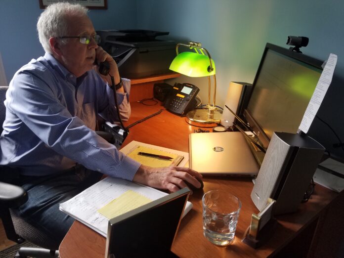 DONALD NOKES, president of president of NetCenergy LLC, a computer support and services company based in Cranston, in his home office. / COURTESY DONALD NOKES