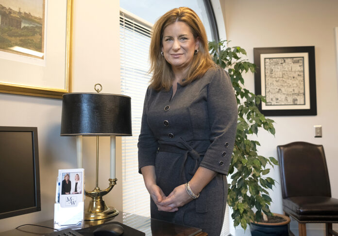 ESSENTIAL SERVICE: Attorney Amy Stratton, who focuses on estate planning and business succession, says clients have sought out the services of her law firm, Moonan, Stratton & Waldman LLP, in these times of uncertainty. / PBN PHOTO/MICHAEL SALERNO