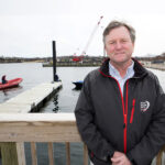 Brad Read started his career in sailing as a sailmaker on Aquidneck Island. Twenty-two years ago, at the age of 33, he was brought on to be executive director of Sail Newport, home to New England’s largest public sailing center. / PBN FILE PHOTO/KATE WHITNEY LUCEY
