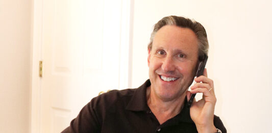 PHONING FROM HOME: Cooley CEO and President Daniel Dwight works from his home in Massachusetts. / COURTESY COOLEY GROUP