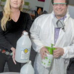 POWERFUL PRODUCT: Allyson Cote, CEO and president of Ocean State Shields, and Todd Thomas, chief innovation officer, with their product, sd90, a coating that stops micro-organism growth for up to a year on surfaces. / PBN PHOTO/MICHAEL SALERNO