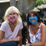 LOCAL TEACHERS Linda Harnois, left, and Linda Greco have created face masks with clear covering to allow faces to remain visible while wearing them. / COURTESY LINDA GRECO