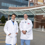 FIRST TIME: Dr. Nabil Toubia, left, gastroenterologist, and Dr. Abdul Saied Calvino, surgical oncologist, recently performed an innovative surgical procedure, to help correct blockage of the digestive system that can occur in patients with advanced duodenal cancer. / PBN PHOTO/MICHAEL SALERNO
