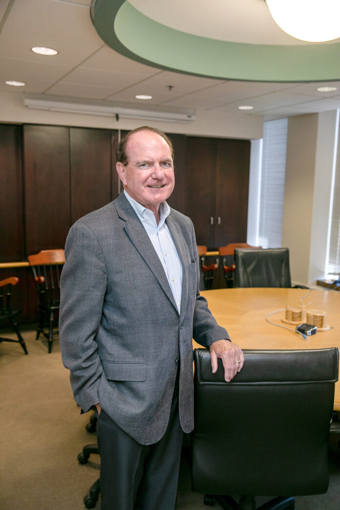 DOMINO EFFECT: Edward “Ned” McCrory, managing partner and certified public accountant for PKF O’Connor Davies LLP, believes that if you take care of your people, your people will take care of clients and clients will take care of business.   PBN PHOTO/TRACY JENKINS