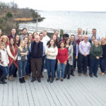 NICE RETREAT: Sansiveri, Kimball & Co. LLP employees enjoy a day by the water at its annual all-employee firm retreat and holiday party at the Squantum Club in East Providence.  / COURTESY SANSIVERI, KIMBALL & CO. LLP