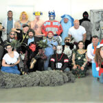 ALL DRESSED UP: Employees for Envision Technology Advisors LLC wear costumes during the company’s annual Halloween event in 2019.  COURTESY ENVISION TECHNOLOGY ADVISORS LLC