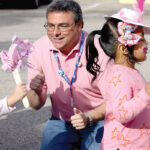 TIME TO CELEBRATE: Children’s Friend CEO and President David Caprio celebrates with students at a community event. / COURTESY CHILDREN’S FRIEND