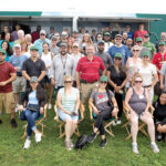 PROPER TRAINING: Employees for Cranston-based Swarovski Optik North America Ltd. pose for a group picture while out during a training day in 2019.  / COURTESY SWAROVSKI OPTIK NORTH AMERICA LTD.