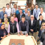 ON THE WATER: Duffy & Sweeney Ltd. employees enjoy the firm’s seaside summer outing in Newport recently.  COURTESY DUFFY & SWEENEY LTD.