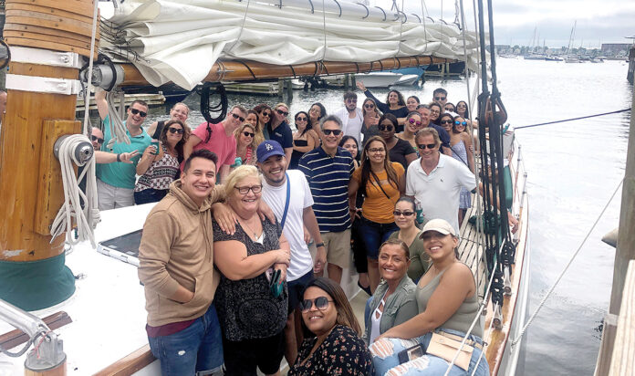 SAILING AWAY: Employees with Marasco & Nesselbush LLP enjoy a boat cruise in 2019. / COURTESY MARASCO & NESSELBUSH LLP