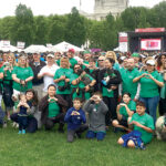 BEST FOOT FORWARD: Neighborhood Health Plan of Rhode Island’s Team Neighborhood members and pets participate in the 2019 American Heart Association of Southern New England Heart Walk in Providence. / COURTESY NEIGHBORHOOD HEALTH PLAN OF RHODE ISLAND