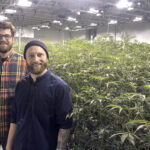 TED GRILLO, left, and Matthew Baryshyan are two cultivation workers at the Ocean State Cultivation Center in Warwick. The United Food and Commercial Workers Local 328 and Ocean State Cultivation Management jointly announced Tuesday that they have agreed to a contract that will make the cultivation center the state’s first unionized cannabis business./COURTESY OCEAN STATE CULTIVATION CENTER