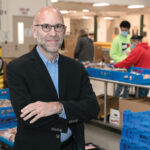 GROWING NEED: Rhode Island Community Food Bank CEO Andrew Schiff has seen the number of individuals needing food increase from 53,000 to 68,000 people per month since March. / PBN PHOTO/TRACY JENKINS
