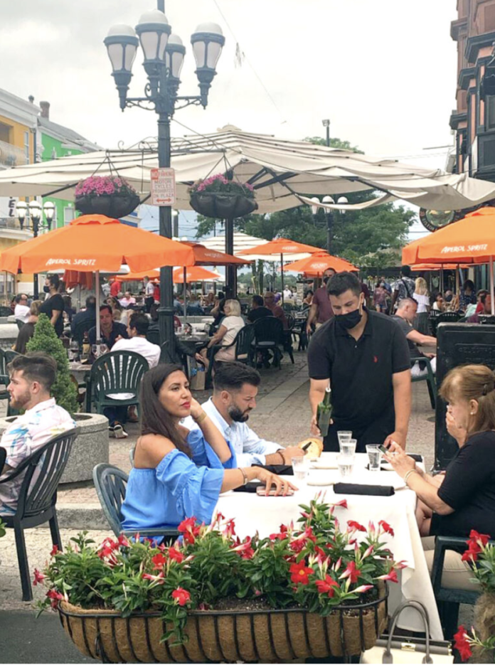 IN GOVERNOR Gina M. Raimondo's new bout of restrictions announced Thursday included early curfews for restaurants and bars. / COURTESY FEDERAL HILL COMMERCE ASSOCIATION