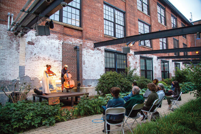 SOUNDS OF SUMMER: Musicians Ashley Frith and Desmond Bratton perform for an outdoor audience during The Wilbury Theatre Group’s “Decameron, Providence” event during the summer of 2020.  / COURTESY ERIN X. SMITHERS