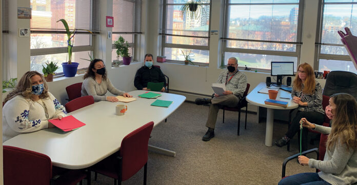 ‘BEST’ IN SHOW: Members of the R.I. Office of Rehabilitation Services’ business engagement specialist team collaborate in their downtown Providence office. / COURTESY R.I. OFFICE OF Rehabilitation Services 