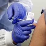THE R.I. DEPARTMENT of Health said that due to the mild side effects caused by the COVID-19 vaccine, staff members of long-term care facilities should be vaccinated in phases to prevent multiple staff members from not feeling well at once. / AP PHOTO/TED S. WARREN