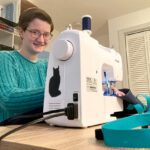 PERSONAL TOUCH: Diana Perkins created the LapSnap, a waterproof canvas bag, to allow wheelchair users to carry items when they go grocery shopping. She learned to sew so she could stitch 10 prototypes to send to test users. / COURTESY INCLUDESIGN LLC