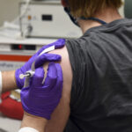 THE TRUMP ADMINISTRATION will no longer hold back required second doses of the Pfizer-BioNTech and Moderna vaccines, practically doubling supply and said that states should immediately start vaccinating other groups lower down the priority scale, including people age 65 and older, and younger people with certain health problems. / COURTESY UNIVERSITY OF MARYLAND SCHOOL OF MEDICINE VIA AP