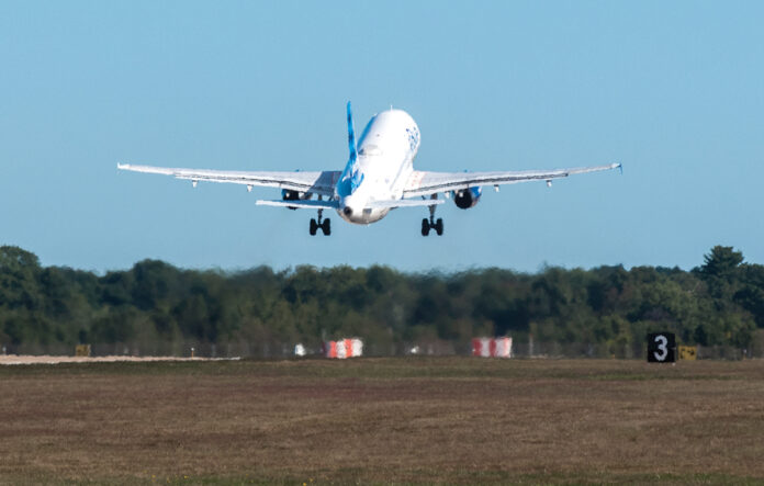LONG HAUL:  A JetBlue Airways flight leaves from the main runway at T.F. Green Airport in Warwick. JetBlue’s operations resumed last summer after a brief suspension in the spring when the coronavirus  hit the U.S. / PBN FILE PHOTO/ MICHAEL SALERNO