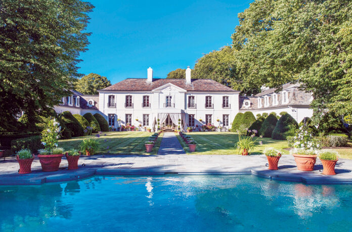STATELY SURROUNDINGS: The 9-acre Ker Arvor estate at 275 Harrison Ave., Newport, sold on Dec. 29 to a Silicon Valley tech executive and his wife, a novelist, for $7.3 million. / Courtesy Lila Delman Real Estate