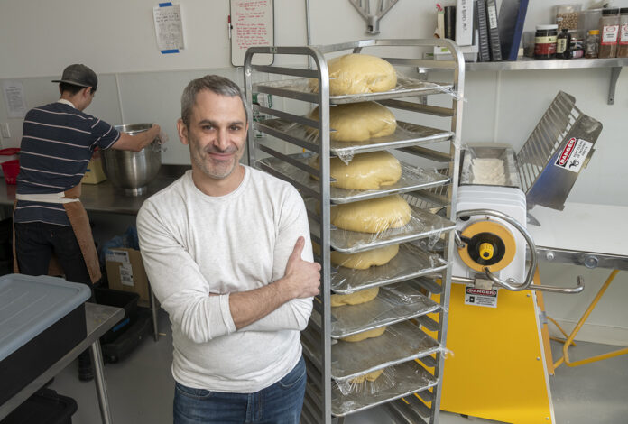 PUT TO THE TEST: Adam Lastrina, owner of Knead Doughnuts in Providence, posted on social media that the day before Valentine’s Day last month was one of the company’s biggest production days ever. / PBN FILE PHOTO/MICHAEL SALERNO
