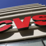 CVS Health has announced it will reopen its headquarters in Woonsocket in September. / AP FILE PHOTO/GENE J. PUSKAR