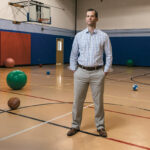 JUGGLING ACT: Christopher Earle, director of information systems for the YMCA of Greater Providence, has been called upon to perform duties beyond his core ­responsibilities. / PBN PHOTO/RUPERT WHITELEY