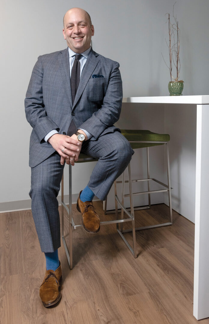 Cliff Wood was named executive director of The Providence Foundation in 2017, with a goal of promoting the physical, economic and cultural development of the capital city’s downtown. He’s also served as the Downtown Providence Parks Conservancy’s executive director since 2008. / PBN PHOTO/MICHAEL SALERNO