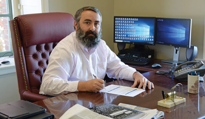 WORD OF CAUTION: Matthew Weldon, the director of the R.I. Department of Labor and Training, says a ruling by the DLT’s Board of Review doesn’t mean that everybody who has transportation problems will be eligible for unemployment benefits. / PBN PHOTO/ELIZABETH GRAHAM