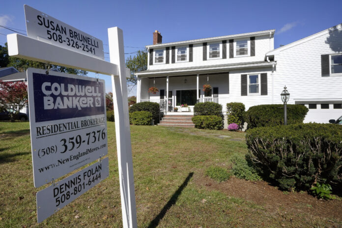 THE MEDIAN SALE price of a home in Bristol County, Mass. in May was $410,000. / AP FILE PHOTO/STEVEN SENNE