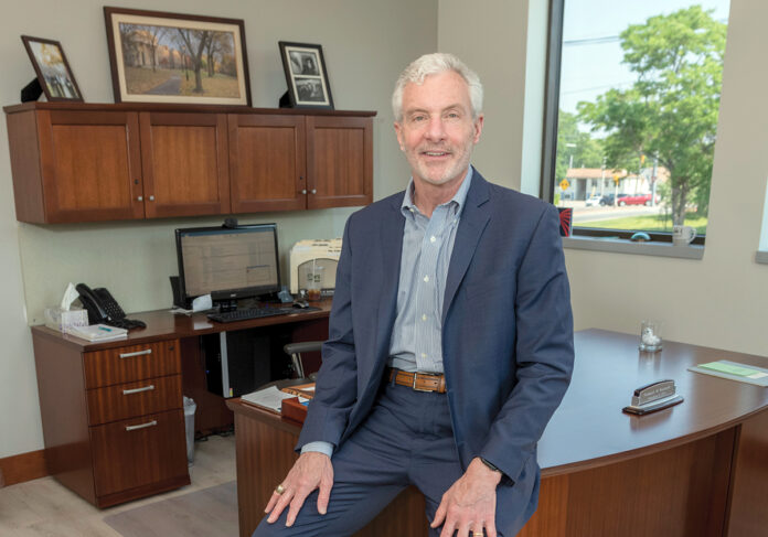 OPENING THE DOOR: Frederick Reinhardt, CEO and president of Greenwood Credit Union, says the Warwick credit union started providing services to cannabis-related businesses in part because of safety concerns over operating a large all-cash enterprise. / PBN PHOTO/MICHAEL SALERNO