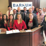 SEEING RED: Barnum Financial Group employees collectively wear red to support heart and cardiovascular health. / COURTESY BARNUM FINANCIAL GROUP
