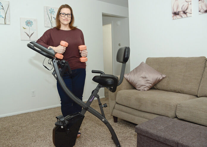FAST ­RESULTS: Amy Palazzo, a patient at the Lifespan Center for Weight Loss and Wellness, has lost 87 pounds since signing up for a medically supervised fasting program at the center in ­February. / PBN PHOTO/ELIZABETH GRAHAM