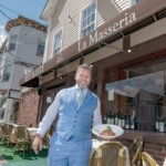 DECISION PAYING DIVIDENDS: Manny Tampella, manager of La Masseria restaurant in East Greenwich, says the Main Street eatery is experiencing its “best year ever,” helped in part by the traditionally dine-in restaurant’s decision to start offering takeout meals. / PBN PHOTO/MICHAEL SALERNO