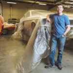 SERIOUS WORK: For Michael Mancini, owner of American Muscle Car Restorations in North Kingstown, pictured here in 2018, restoring cars began as a family hobby that has turned into a full-time career. / PBN FILE PHOTO/RUPERT WHITELEY
