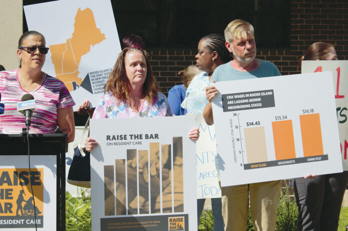 RAISE THE BAR ON RESIDENT CARE members call for wage increases and staffing improvements outside the Bannister Center for Rehabilitation and Health Care in Providence in 2019. / COURTESY RAISE  THE BAR ON RESIDENT CARE
