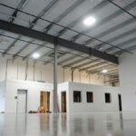 SNAPPED UP: Warehouse space is hard to come by lately, and that was illustrated by this recently completed flex building at the Quonset Business Park in North Kingstown. The space has already been leased by two businesses that will use the building for warehousing and other purposes. / PBN PHOTO/ELIZABETH GRAHAM