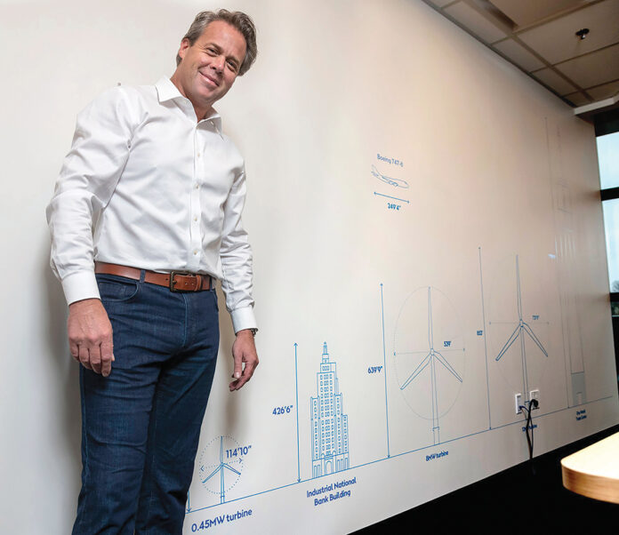 R.I. LARGE SCALE: Matthew Morrissey, head of Northeast markets for Orsted U.S. Offshore Wind Power, stands in the company’s office in Providence in March 2020. / PBN FILE PHOTO/MICHAEL SALERNO