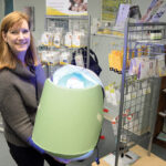 BRIGHT IDEA: Kathleen Moren, Healthy Babies, Happy Moms Inc. president, displays phototherapy equipment that allows nurses from her company to treat babies with jaundice at home rather than in a ­hospital.  PBN PHOTO/ELIZABETH GRAHAM