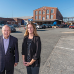 THE PHILLIPSDALE LANDING INDUSTRIAL COMPLEX at 310 Bourne Ave. in East Providence recently sold for $8.3 million after being on the market for four months, according to MG Commercial President Mike Giutarri, left, who closed the deal alongside his firm's vice president, Julie Freshman. / PBN FILE PHOTO/MICHAEL SALERNO