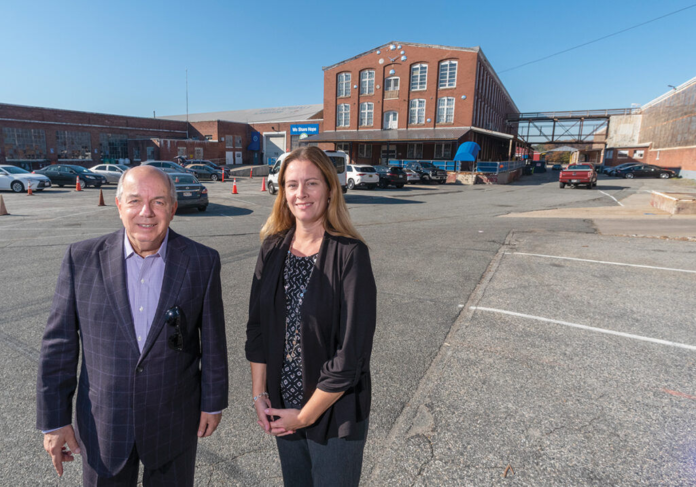 THE PHILLIPSDALE LANDING INDUSTRIAL COMPLEX at 310 Bourne Ave. in East Providence recently sold for $8.3 million after being on the market for four months, according to MG Commercial President Mike Giutarri, left, who closed the deal alongside his firm's vice president, Julie Freshman. / PBN FILE PHOTO/MICHAEL SALERNO