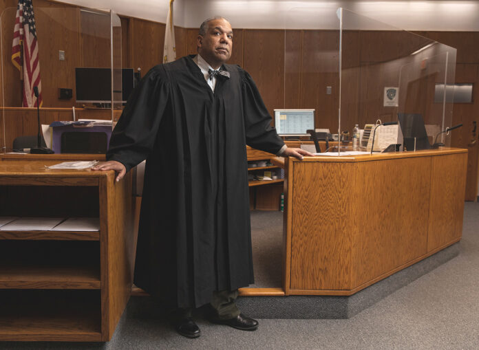 A SPOT ON THE BENCH: William J. Trezvant was one of two people of color sworn in as state judges in January, but some argue Rhode Island hasn’t done nearly enough to diversify the judiciary. / PBN PHOTO/RUPERT WHITELEY