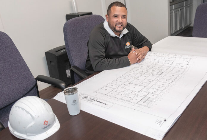 HELPING HAND: Jhonny Leyva, owner and president of Heroica Construction Inc. in Providence, says state government needs to do more to support minority contractors by awarding projects properly.  / PBN PHOTO/MICHAEL SALERNO